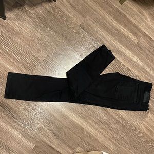 Black ripped knee jeans